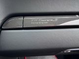 a close up of a car door handle with a sticker on it