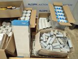 many boxes of cans and cans of other items in the room