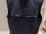 navy blue vest with blue zippers on a mannequin head