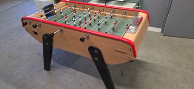 a foosball table in the middle of a room