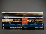 several books stacked on top of each other on a table