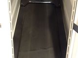 an image of the inside of a refrigerator with the door open