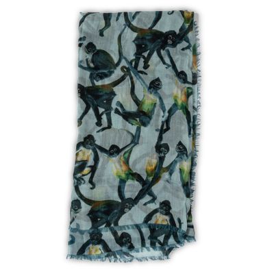 a scarf with monkeys and flowers on a blue background