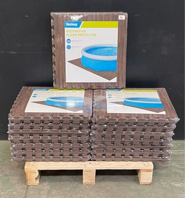 two boxes of pool mats stacked on top of a pallet