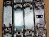 a close up of a train engine on the ground