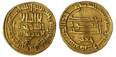 une pièce d'or sur laquelle figure l'image d'un homme