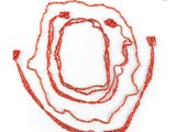 red coral beaded necklaces on a white background