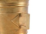 a gold mortar with a metal handle on a white background