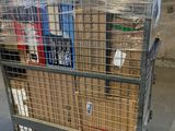 a cart that has a bunch of boxes in it
