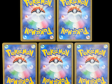 four pokemon cards with a picture of a pokemon in the middle of them