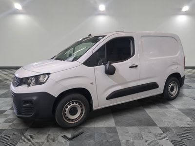 a picture of a white van parked on a checkered floor