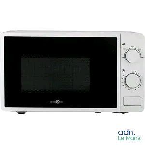 white microwave oven with electronic controls on a white background