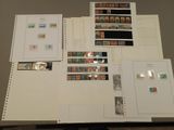 a lot of different stamps on the pages of a book