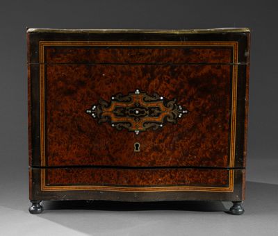 an old wooden chest with a decorative design on the front