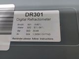 a label on the back of a printer that says digital refractor