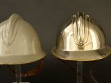 two helmets that are sitting on top of each other