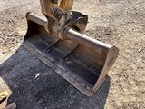 a bulldozer that is sitting in the dirt