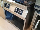 a stainless steel stove and oven in a kitchen