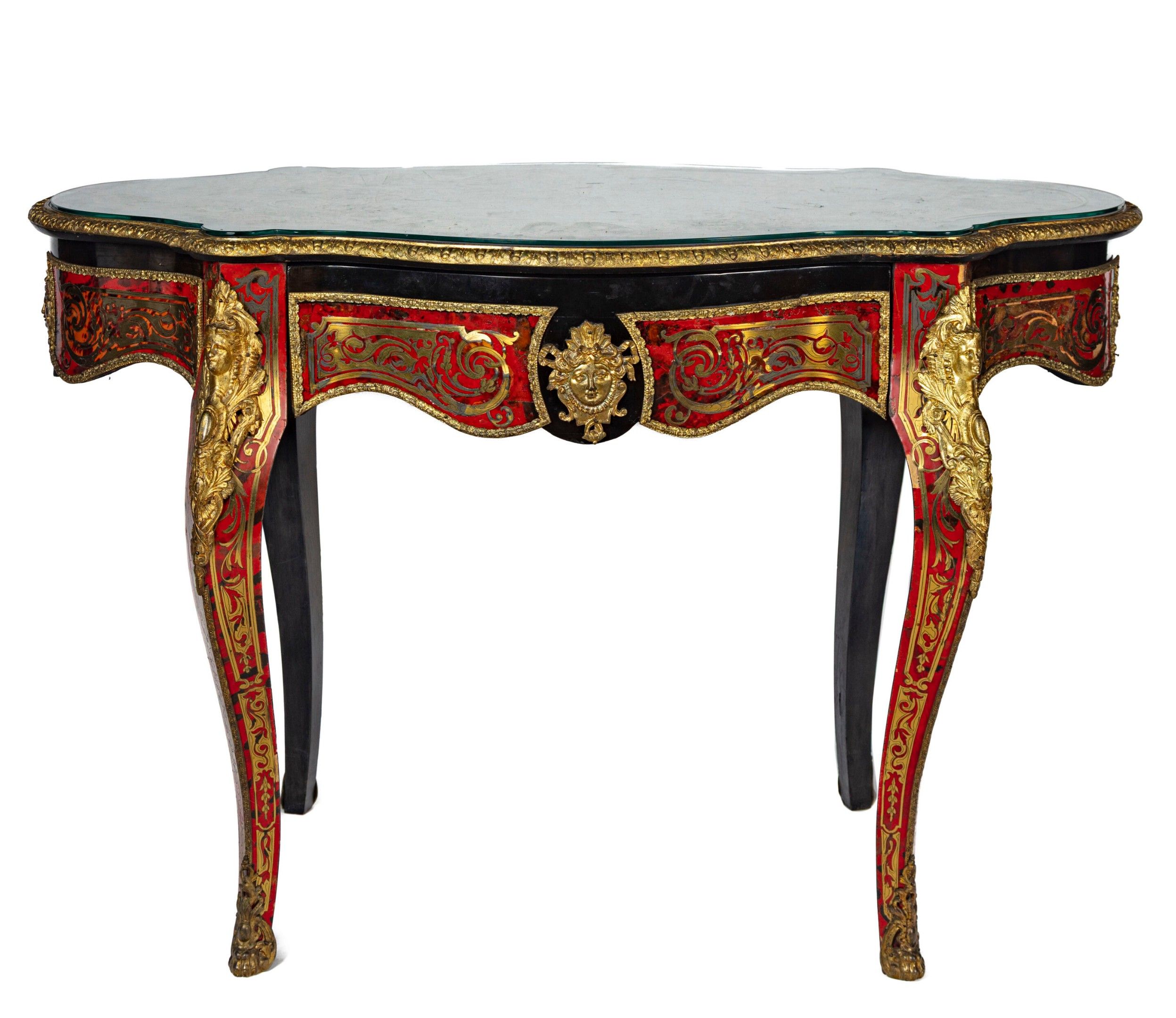 Table de milieu de forme violonée en placage d'ébène à décor…