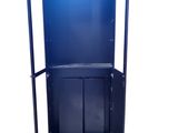 a blue metal cabinet with a shelf on top of it