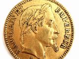 l'image d'une pièce d'or sur laquelle figure le visage d'un homme