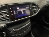 the interior of a car with a touch screen in the center of the dashboard