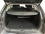 a trunk of a car with the back seats folded down