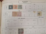an open book with a lot of stamps on it