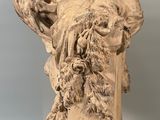 statue of a woman holding a child in her arms