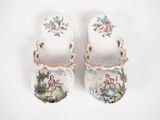 a pair of clogs with a picture of a woman and a child on them