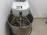 a mixer in the corner of a bathroom with a number on it