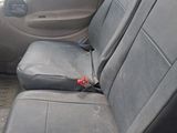 a seat in the back of a car that is empty
