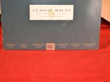 an image of a box with a label on it sitting on a red cloth