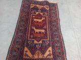 rug on the floor of a room with a cat laying on it