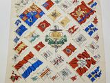 an image of a table cloth with a pattern of flags and symbols