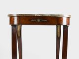 a small table with a marble top on a wooden base