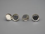three pairs of silver and black stone cufflinks