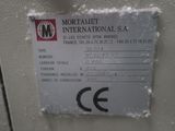 a picture of a sign on a wall that says mortainet international s a