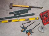 many tools that are laying out on the floor