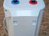 a white container with two red and blue knobs on it