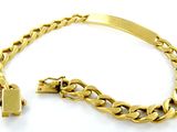 une image représentant un bracelet en or muni d'un fermoir, sur fond blanc
