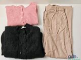 three pieces of clothing sitting on top of a table next to each other