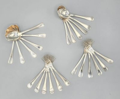 four pieces of silverware with spoons and forks on a table