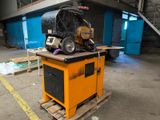a machine that is sitting on a pallet in a warehouse