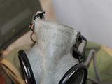 a gas mask that is sitting on top of a table