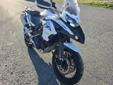 a motorcycle that is parked on the side of the road