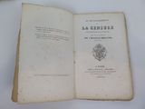 an open book with a picture of a coat of arms on top of it
