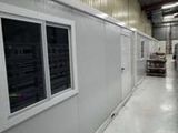 an image of a long room with a lot of windows