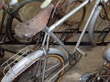 a bike that is parked next to other bikes