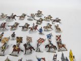 a lot of figurines that are on a table